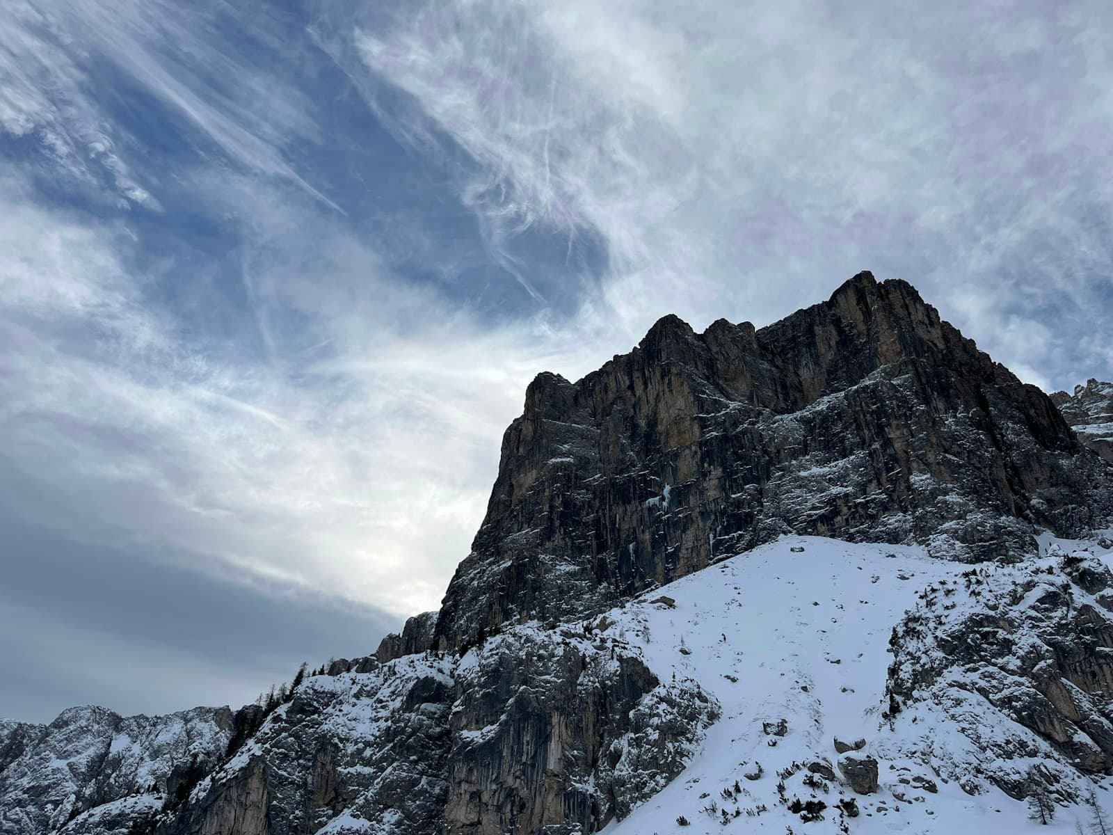 The pale limestone peaks of the Dolomites at dawn.